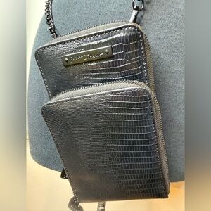 Betsey Johnson black crocodile-embossed crossbody phone bag with a chain strap